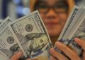 Perang Dagang Kian Panas,  Rupiah Diprediksi Dikisaran Rp14.428/USD