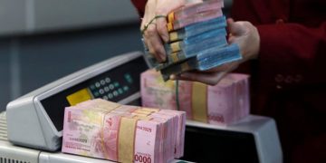 Perang Dagang Kian Panas, Rupiah Diprediksi Dikisaran Rp14.428/USD